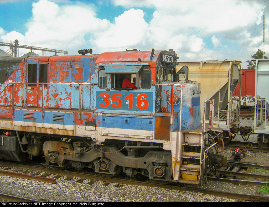 FXE C30-7 Locomotive in the yard with faded paint scheme